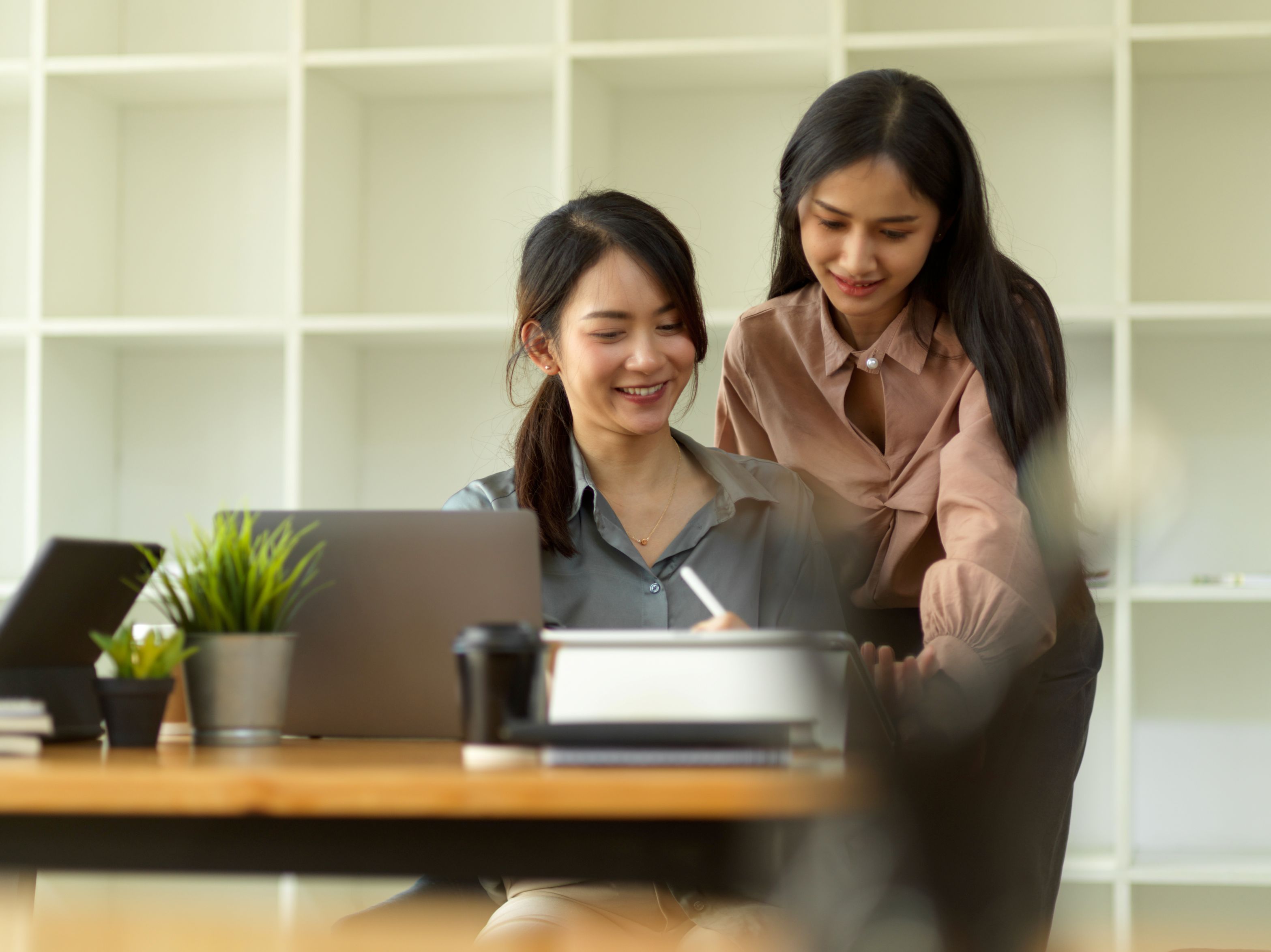 Young business woman working at a table